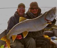Keith Sherman and Trevor holding a big Lake trout