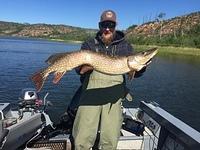 GUIDE CURTIS WITH A NICE TROPHY PIKE