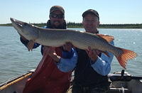 Mike Case and Nevin with a 45" Northern Pike
